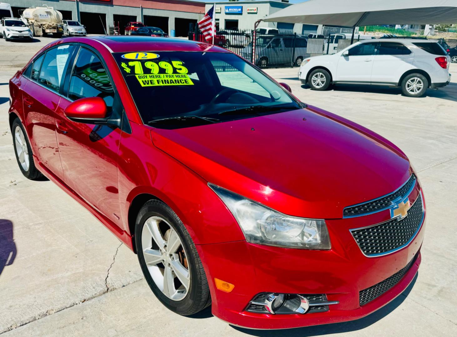 2012 Red Chevrolet Cruze LT , located at 2190 Hwy 95, Bullhead City, AZ, 86442, (928) 704-0060, 0.000000, 0.000000 - 2012 Chevrolet Cruze LT. automatic, leather, moonroof, loaded. In house financing available.Buy here pay here. Free Carfax. Free warranty. - Photo#0